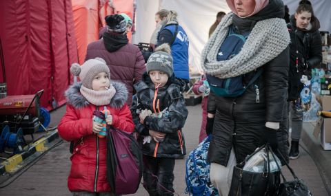 Refugees at the Zosin crossing point, Poland.