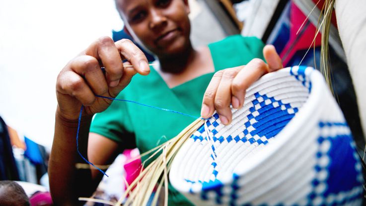 In Uganda Cossy, a survivor of violence, now works as a basket weaver, and does outreach in her community to support other survivors.